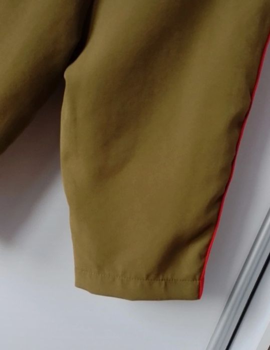 Materiałowe damskie spodenki do kolan rozm.M
