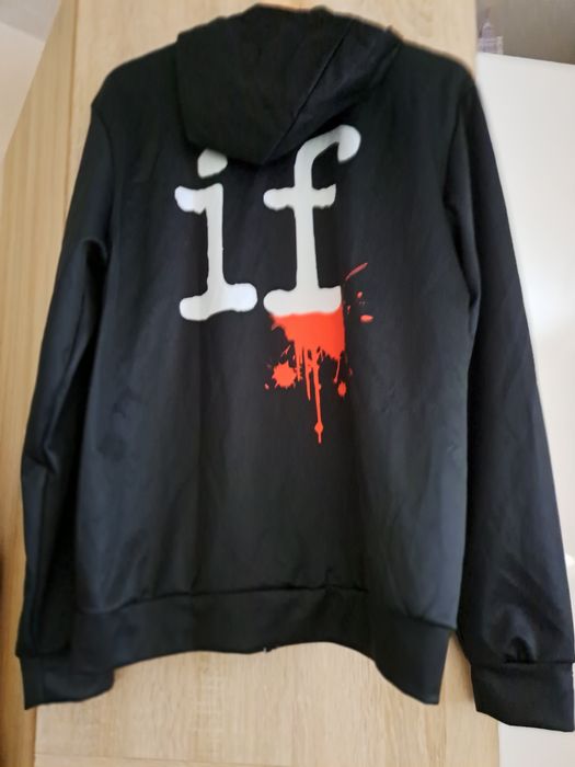 Młodzieżowa czarna wiosenna bluza z połyskiem.