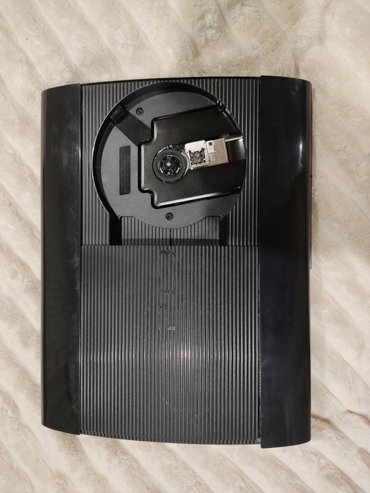 PS3 super slim 500gb. 2джойстика з іграми прош.Hen