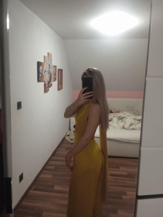 Kombinezon dekolt głęboki błyszczący mieniący sylwester XS s imprezowy