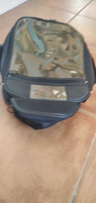 Mochila com imans para depósito de mota