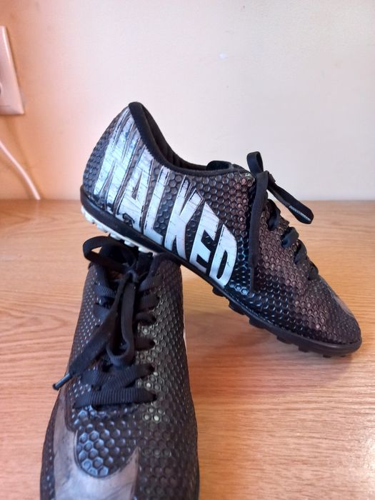 Футбольні бутси.