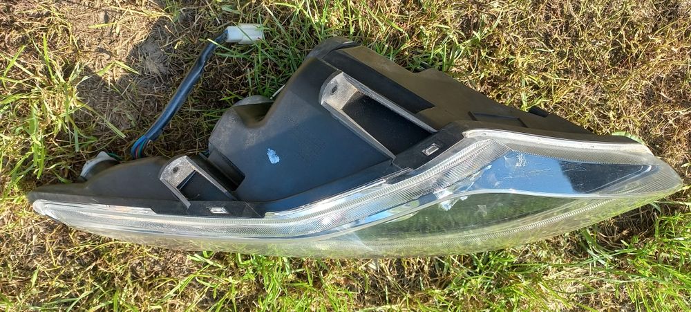 Lewa lampa kymco downtown 125 300
