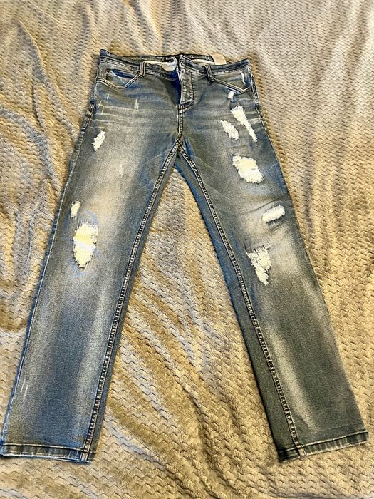 Dżinsy z przetarciami