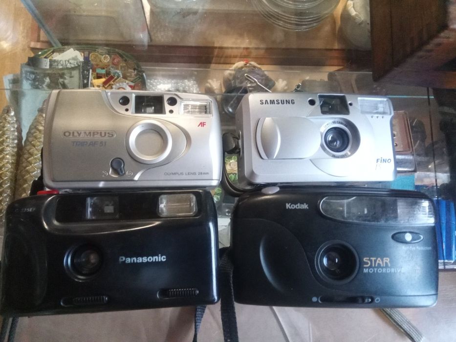 Фотоаппарат "Олимпус","Самсунг"