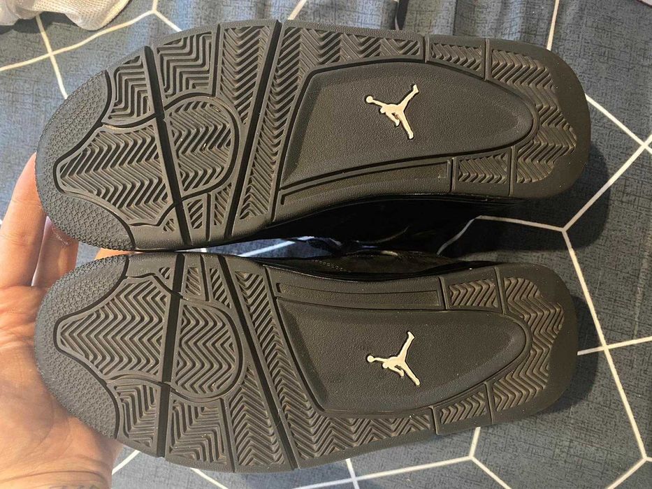 Air Jordan 4 black cat