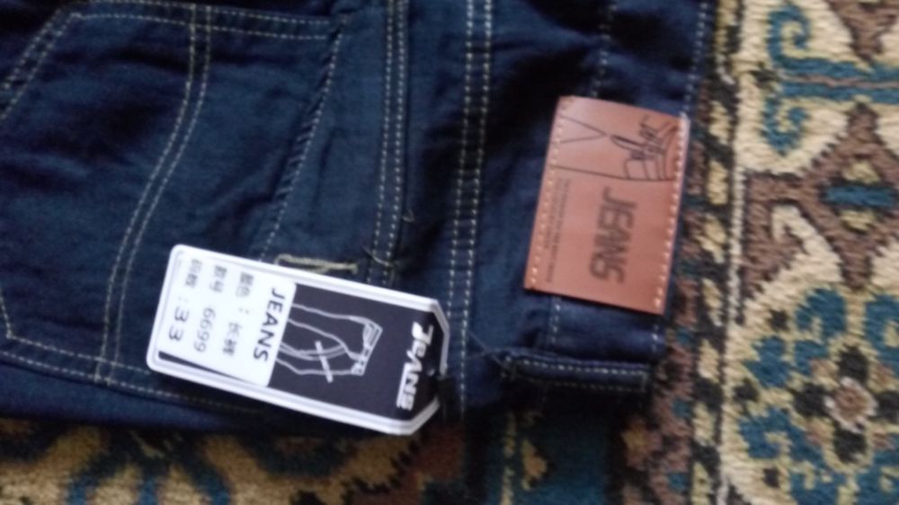 Продам новые джинсовые летние брюки.