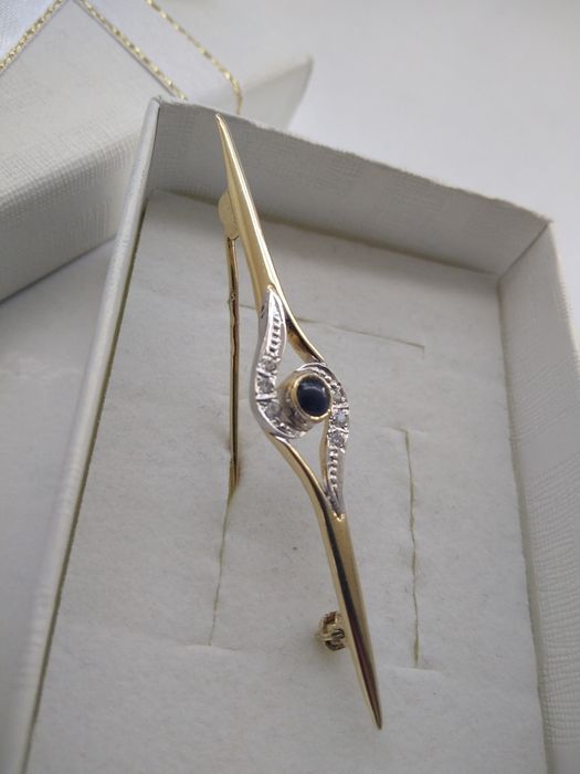 Złota broszka z cyrkoniami złoto 585  803