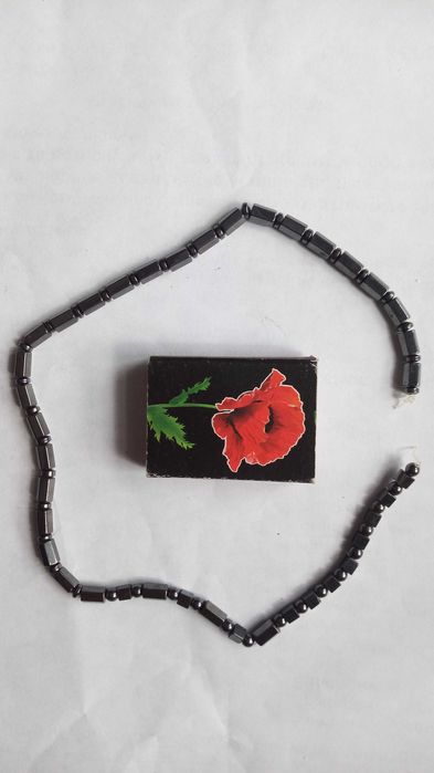 Бижутерия, бусы бывшие в употреблении.