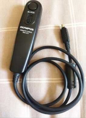 Vários Olympus (bcm-2,  grip HLD-4, RM-UC1)