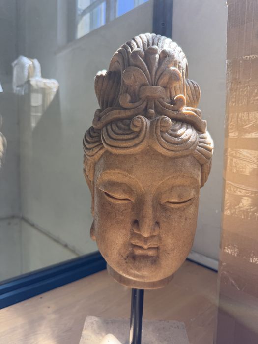 Escultura budista el oedra de sabão