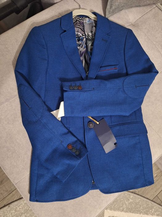 Дитячий одяг на хлопчика 10-12 років