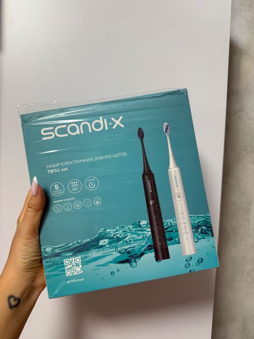 Новая зубная электрическая щетка черного цвета Scandi.x