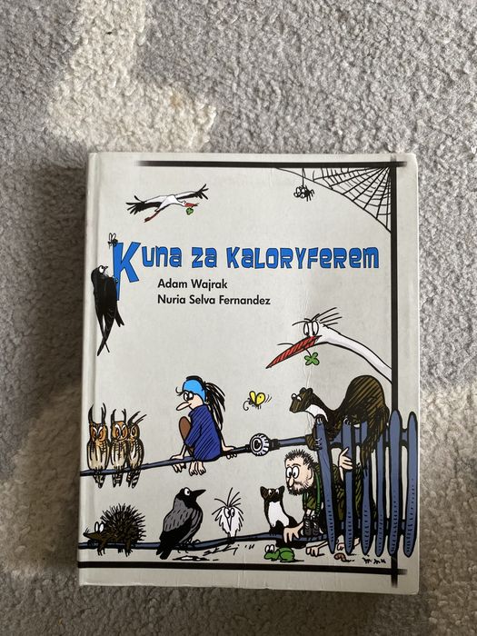 Kuna za kaloryferem. Adam Wajrak, Nuria Fernandez