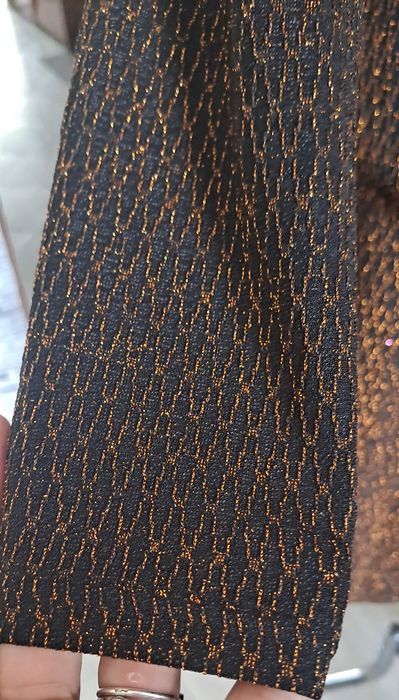 Sliczny czarno złotym komplet bluzka i spódnica