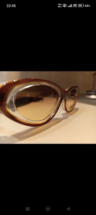 óculos de sol Prada feminino