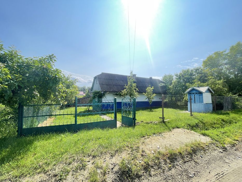 Будинок з приватизованою земельною ділянкою