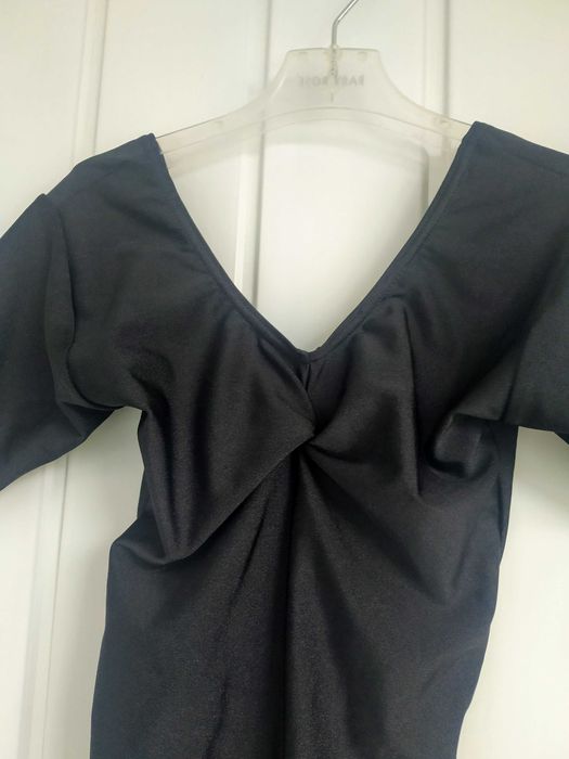 Костюми на виступ та одяг для тренувань:тріко (купальник), комбезшорти