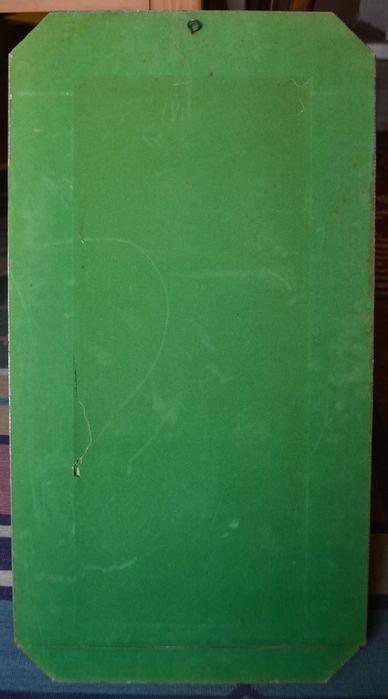 Espelho com moldura em folha de estanho.