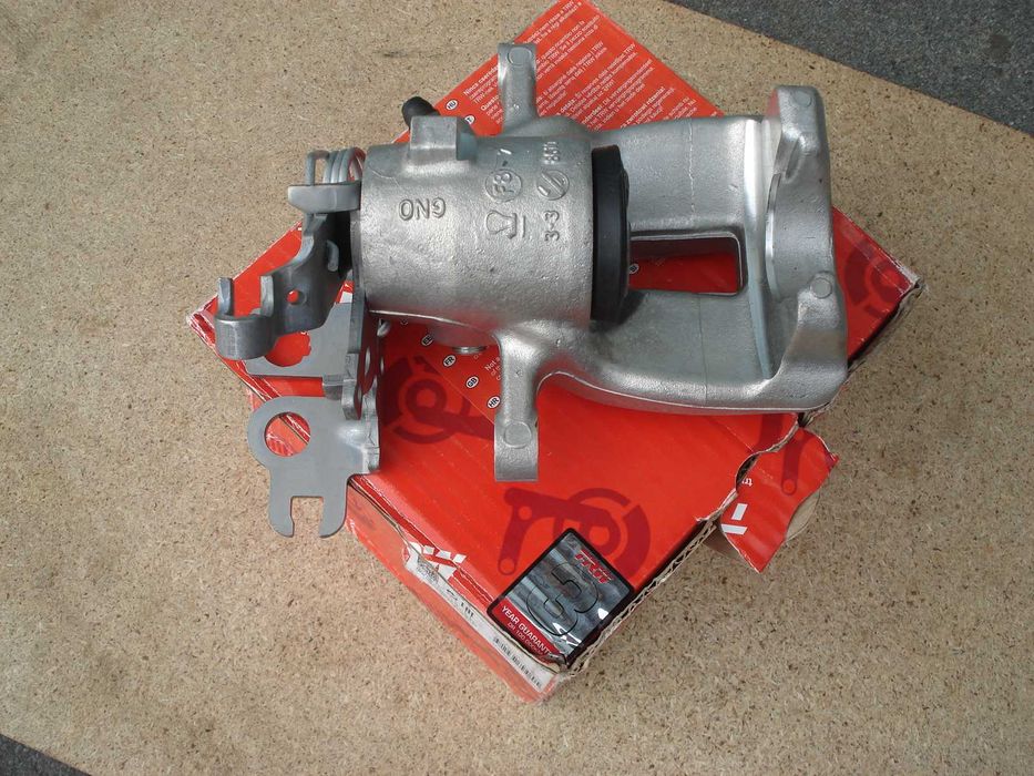 Суппорт задній правий Кадді 3(04-15) Caddy3