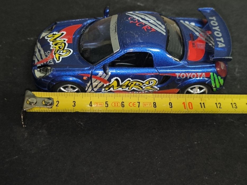 Carrinho Toyota MR2 Azul
Miniatura de um carro desportivo Toyota MR2.