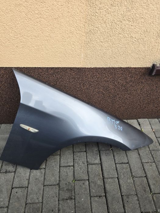 BMW serii 3 E90 / E91 - błotnik (strona pasażera)
