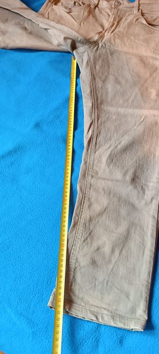 Spodnie jeans piaskowe sinsay 34