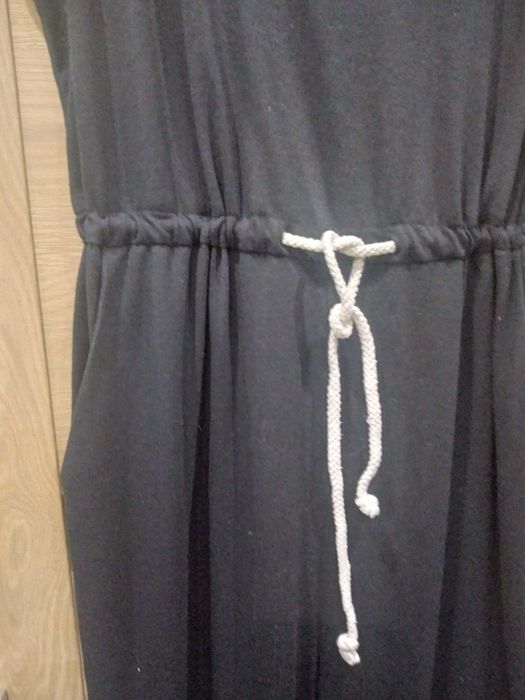 Fajny czarny kombinezon rozm M/XL biust 96/110cm