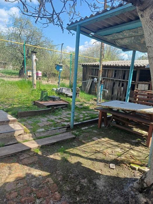 Продам 1/2 будинка в м.Богодухові