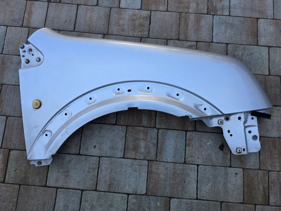 Ford tourneo connect 03-13 błotnik prawy przód srebrny wysyłka