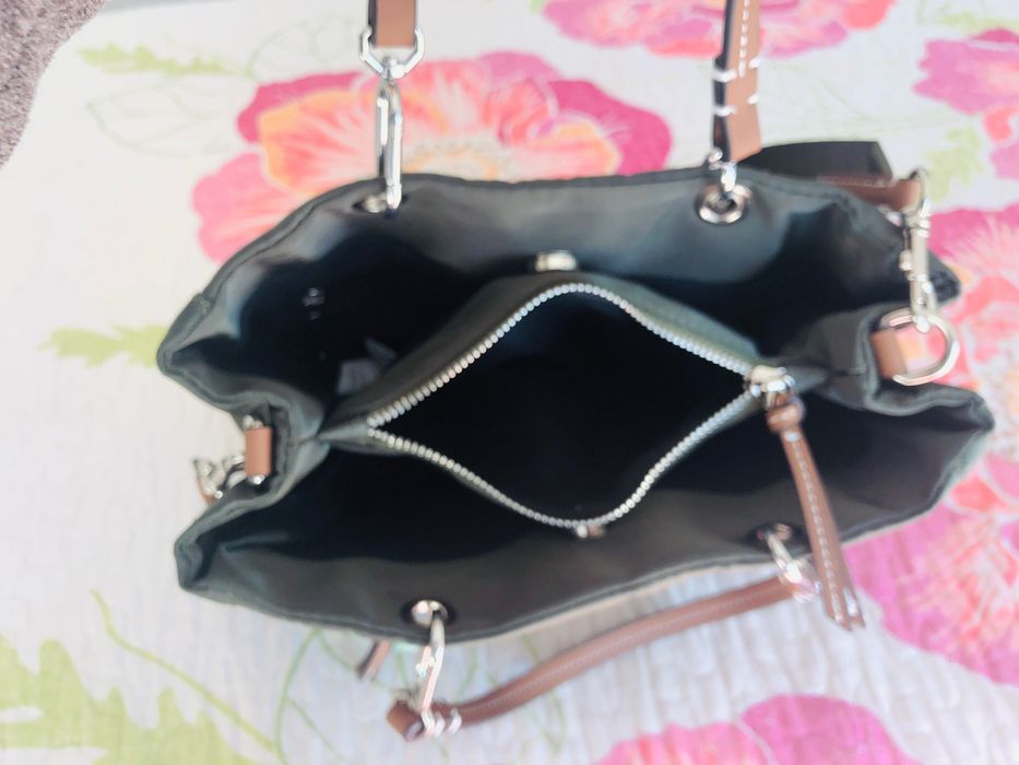 Mala parfois a tiracolo