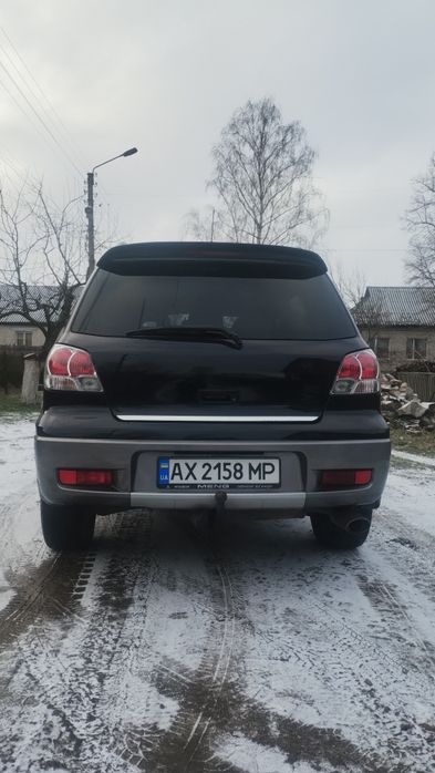 Аутлендер 2.4 бензин