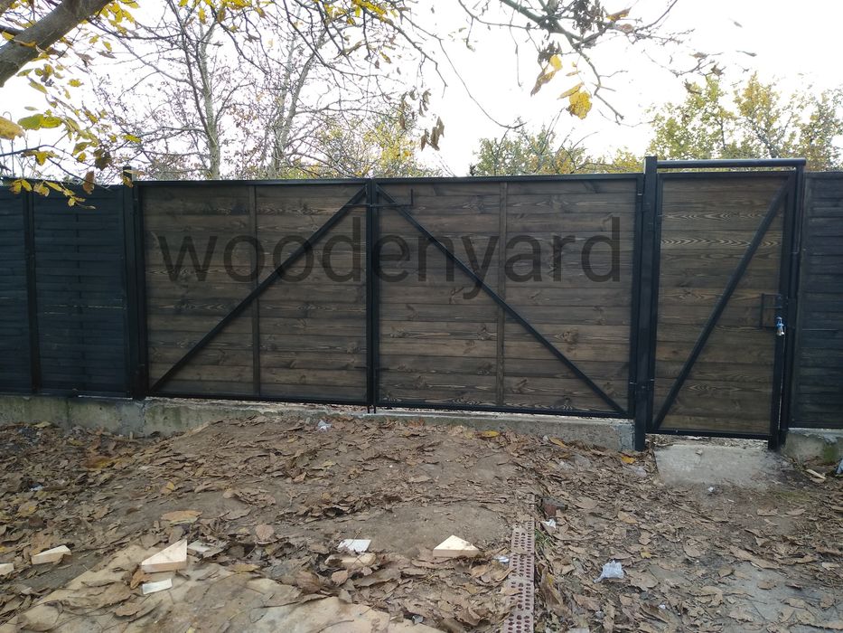 Ворота, заборы из дерева и металла.