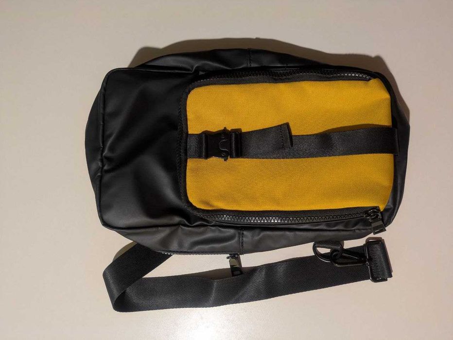 Męska saszetka nerka torba Reserved przez ramię