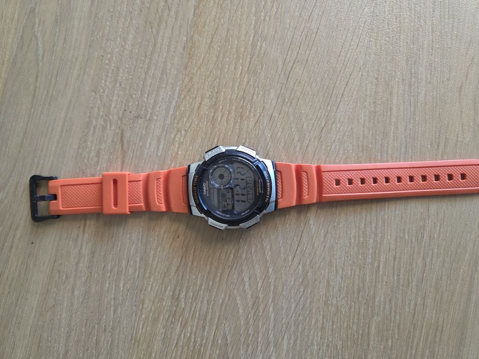 Relógio Casio AE-1000W World Time (Bracelete Laranja)