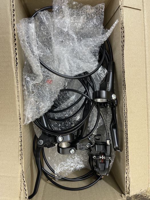 Гальма гідравлічні Shimano MT200 + диски