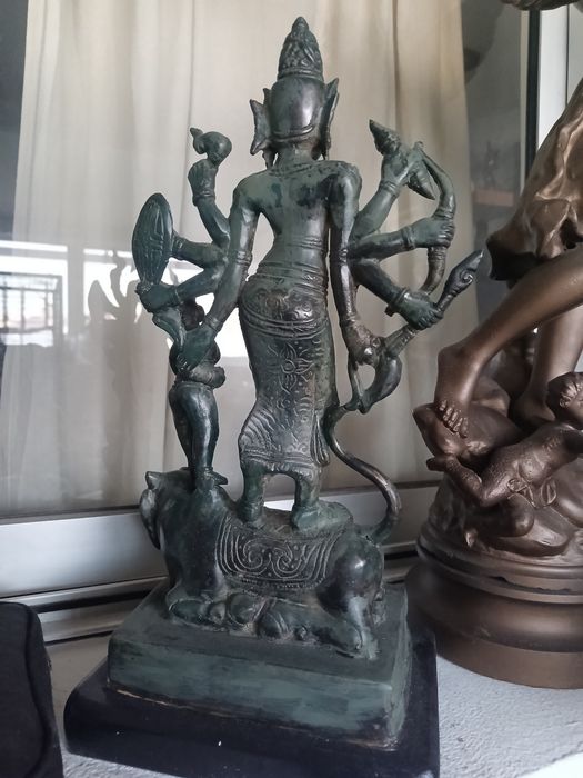 Shiva em bronze com base em madeira