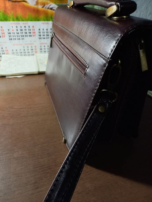 Продам барсетка темно коричневого цвета