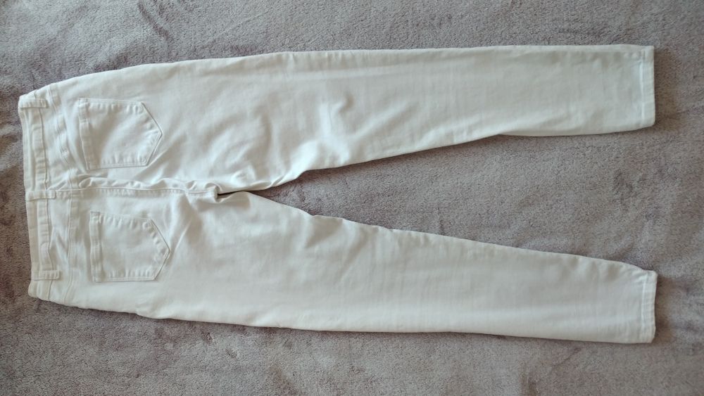 Biale spodnie skinny damskie rozm M