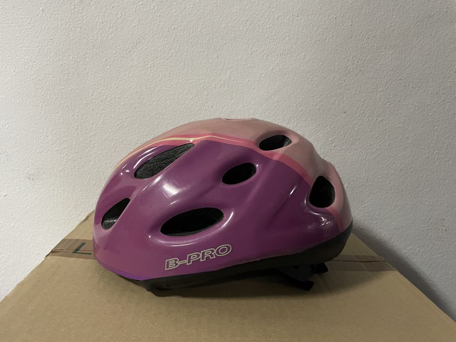 Capacete rosa de crisnça para bicicleta ou patins