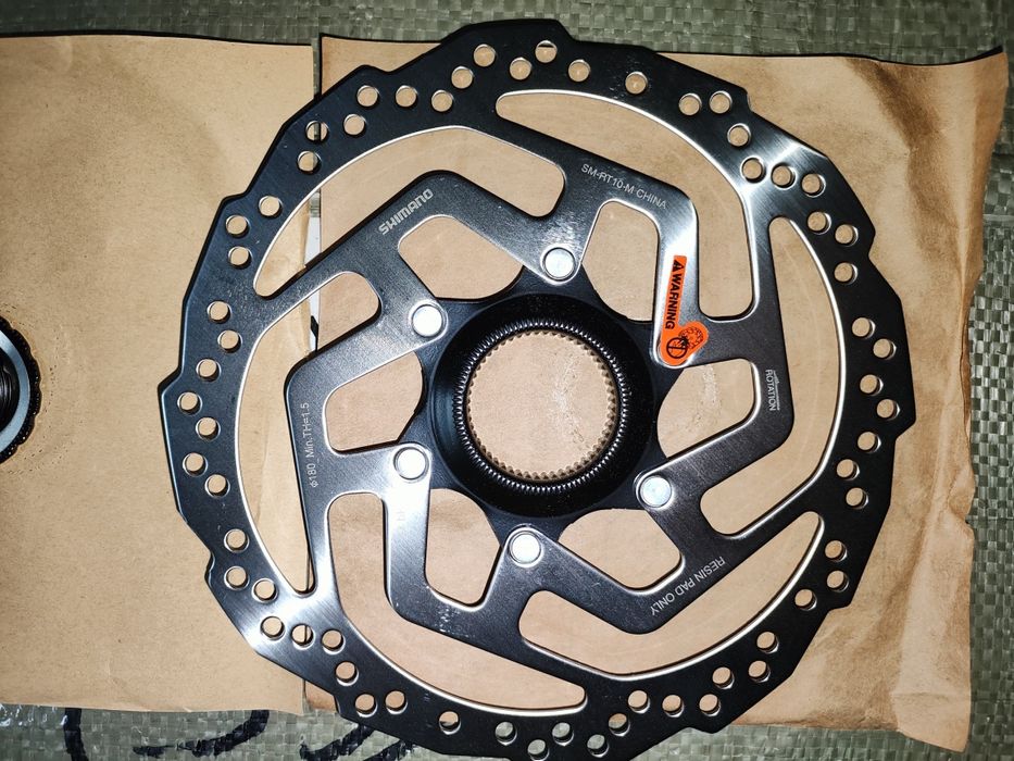 Диск тормозной , central lock, 160 и 180 мм диаметр Shimano SM-RT10-M