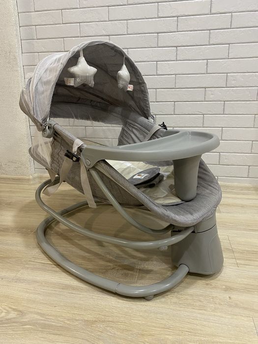 Коляска 2в1 та заколисуючий центр із розвиваючим килимком