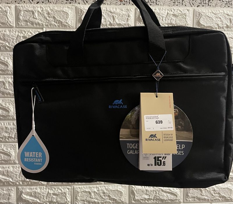 Классна  вологостійка сумка для ноутбука