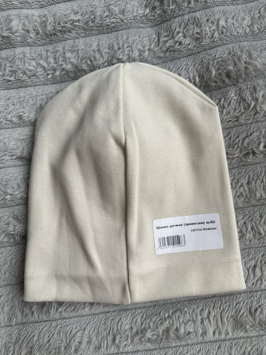 Продам  нові шапочки  універсальні