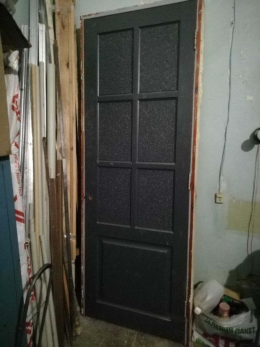 Двери межкомнатные высокие.