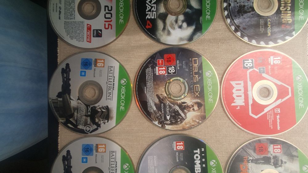 Jogos para Xbox One e Guarda-Discos( só vendo o conjunto todo)