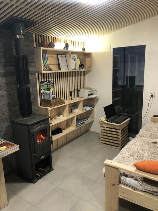 Модульний будинок з каміном.