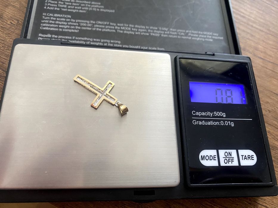 Nowa, ZŁOTA zawieszka krzyżyk , 0,81 g, próba 585, 14 K