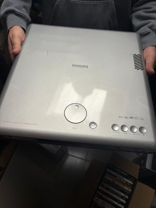 leitor dvd philips juntamente com caixa de dvd