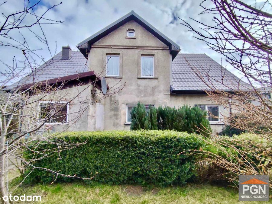 Połowa domu blisko centrum z działką